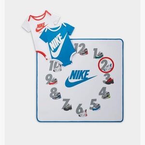 New with tags NIKE 3PC NIKE FIRST YEAR BODY SUIT(2) AND BLANKET SET 0-6m & 6-12m